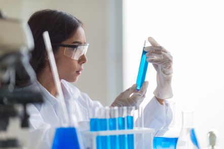 Woman_in_laboratory_working_with_chemicals.png