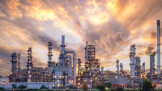 petrochemical plant orange purple sky.jpg